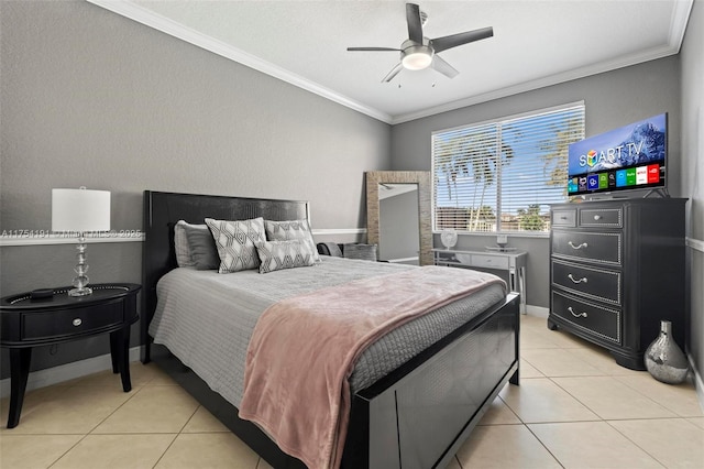 bedroom featuring baseboards, light tile patterned flooring, a ceiling fan, and crown molding