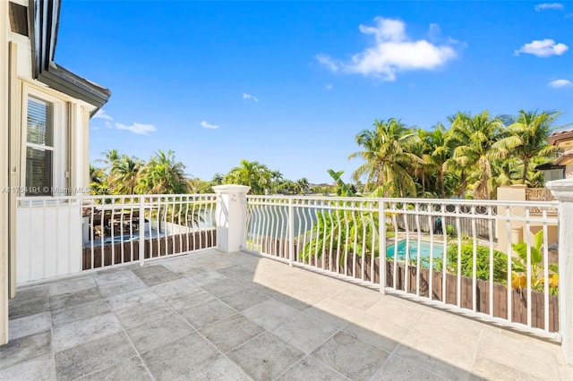 view of patio with a balcony