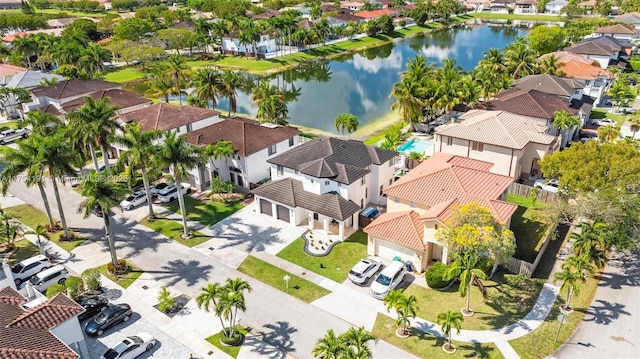 aerial view featuring a residential view and a water view