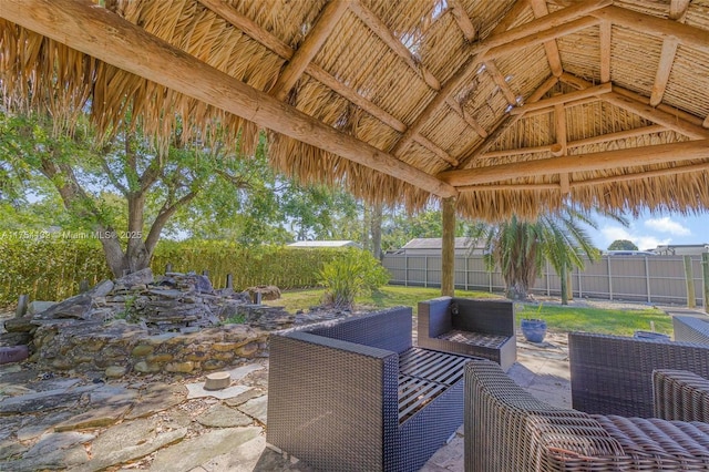 view of patio featuring a fenced backyard and outdoor lounge area