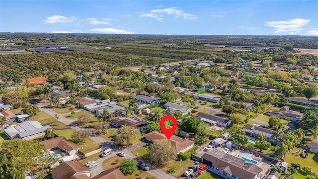 birds eye view of property with a residential view