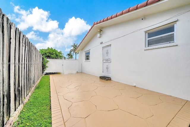 view of patio featuring a fenced backyard