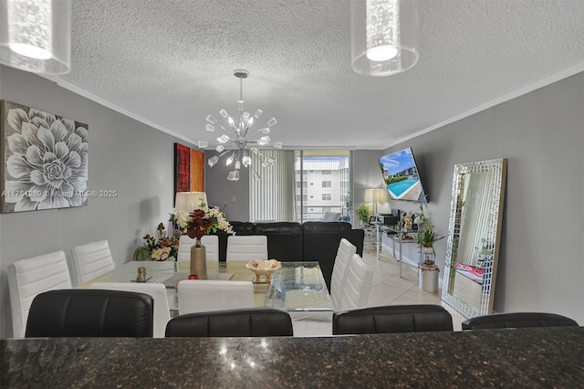 dining room with an inviting chandelier, a textured ceiling, and crown molding