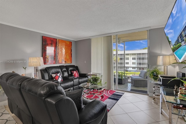 living area featuring expansive windows, ornamental molding, a textured ceiling, and light tile patterned flooring