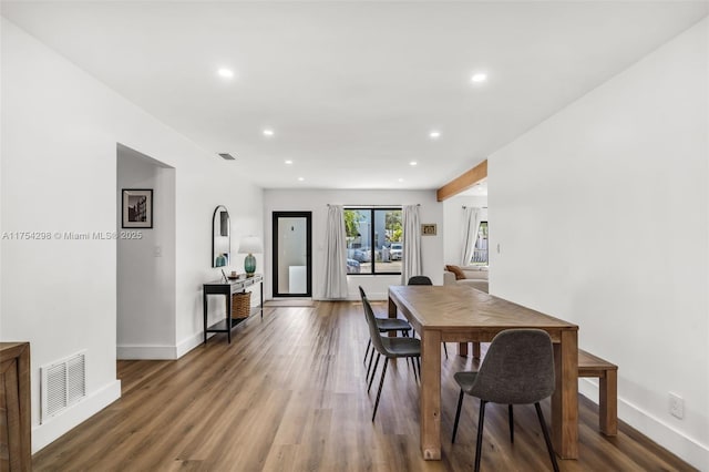 dining area featuring recessed lighting, visible vents, baseboards, and wood finished floors