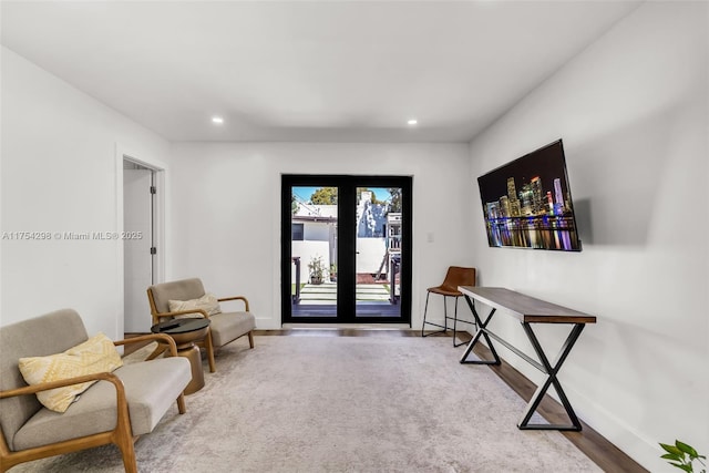 entrance foyer with baseboards and recessed lighting