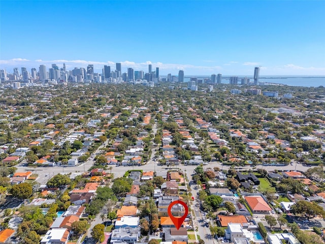 aerial view featuring a water view and a city view