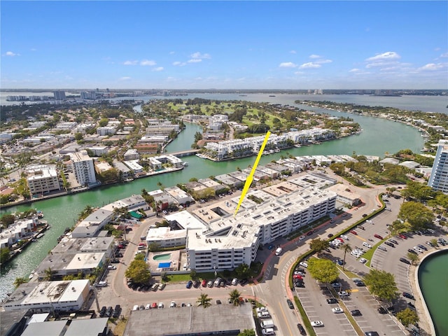 aerial view with a water view and a city view