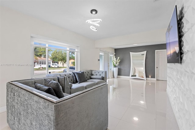 living room featuring light tile patterned floors and baseboards