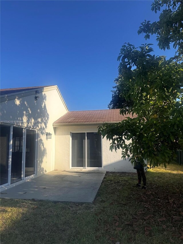 162 NW 207th Ave, Pembroke Pines, FL 33029 - rear view of property featuring a patio area and stucco siding