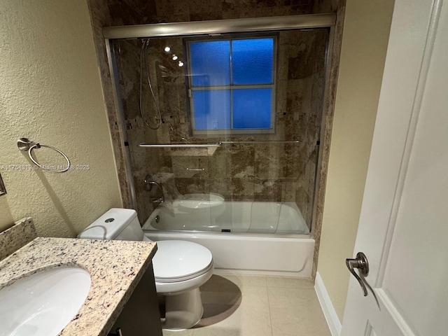 162 NW 207th Ave, Pembroke Pines, FL 33029 - bathroom featuring vanity, toilet, a textured wall, combined bath / shower with glass door, and tile patterned flooring