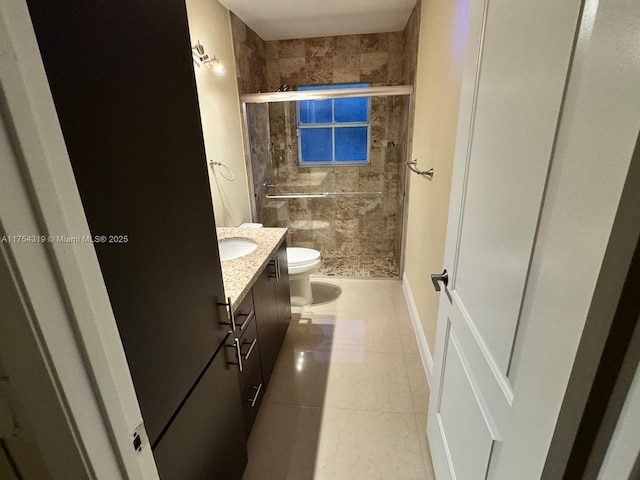 162 NW 207th Ave, Pembroke Pines, FL 33029 - bathroom with vanity, toilet, a shower stall, and baseboards