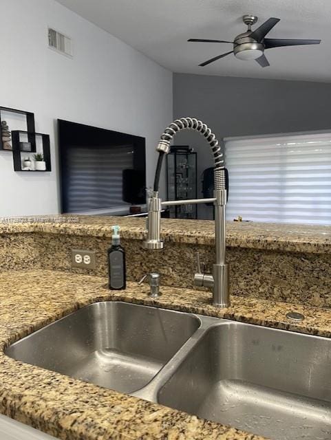 16654 SW 103rd Ln, Miami, FL 33196 - room details featuring stone counters, a sink, visible vents, and a ceiling fan