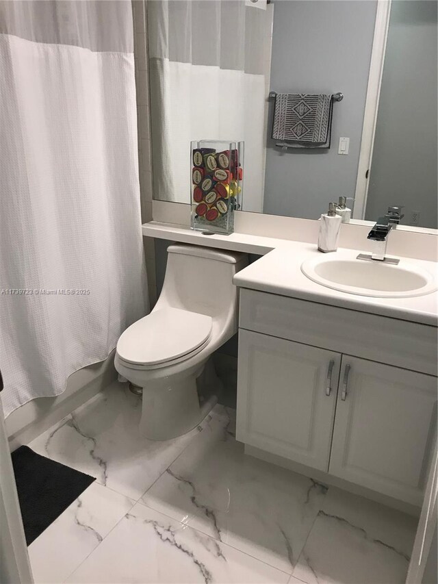 16654 SW 103rd Ln, Miami, FL 33196 - bathroom with marble finish floor, shower / bath combo with shower curtain, vanity, and toilet