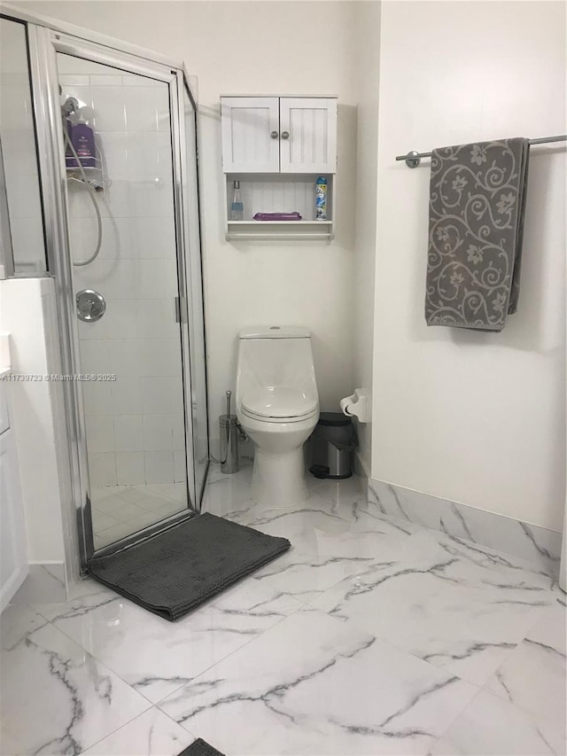 16654 SW 103rd Ln, Miami, FL 33196 - full bathroom featuring marble finish floor, a shower stall, and toilet
