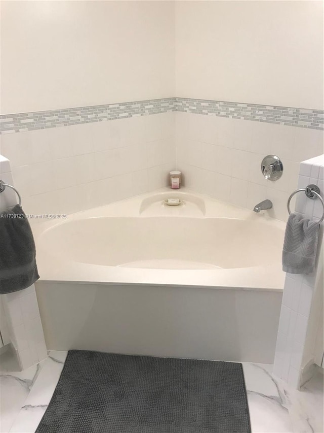 16654 SW 103rd Ln, Miami, FL 33196 - full bathroom featuring a garden tub and marble finish floor