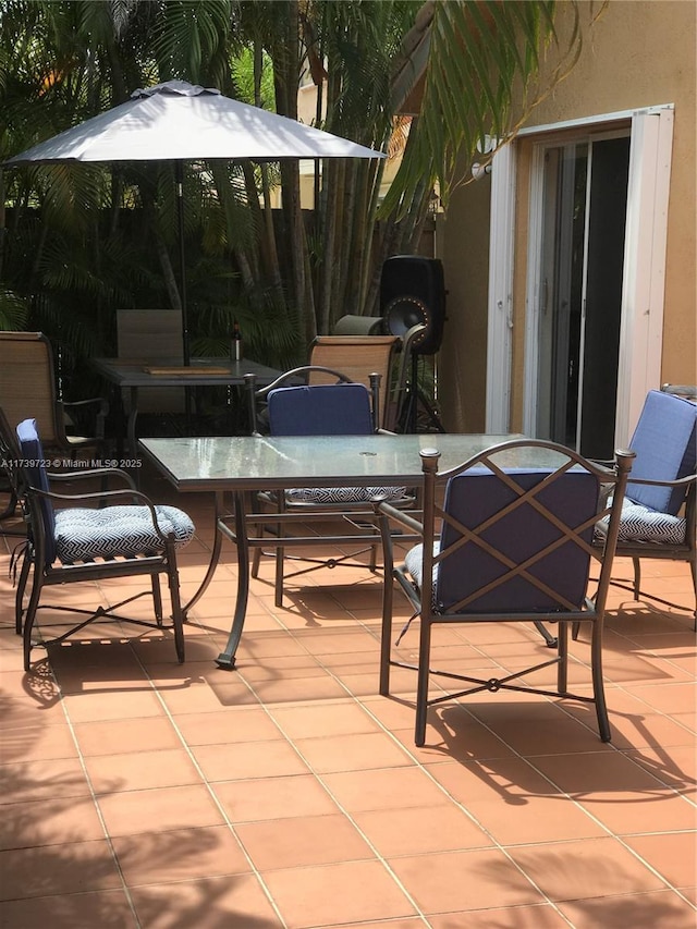 16654 SW 103rd Ln, Miami, FL 33196 - view of patio / terrace with outdoor dining area