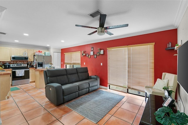 living room with light tile patterned floors, visible vents, a ceiling fan, ornamental molding, and recessed lighting