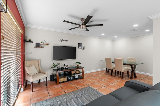 living area with light tile patterned floors, recessed lighting, a ceiling fan, visible vents, and crown molding