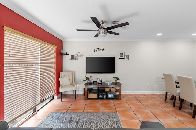 tiled living area featuring baseboards, ornamental molding, a ceiling fan, and recessed lighting