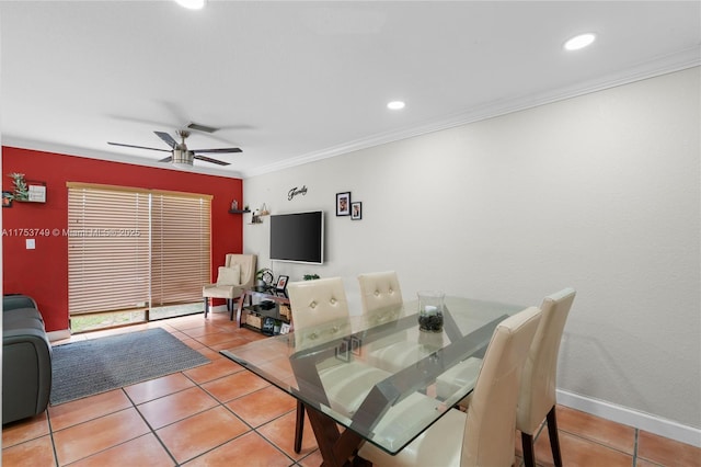 tiled dining space with ceiling fan, recessed lighting, baseboards, and crown molding