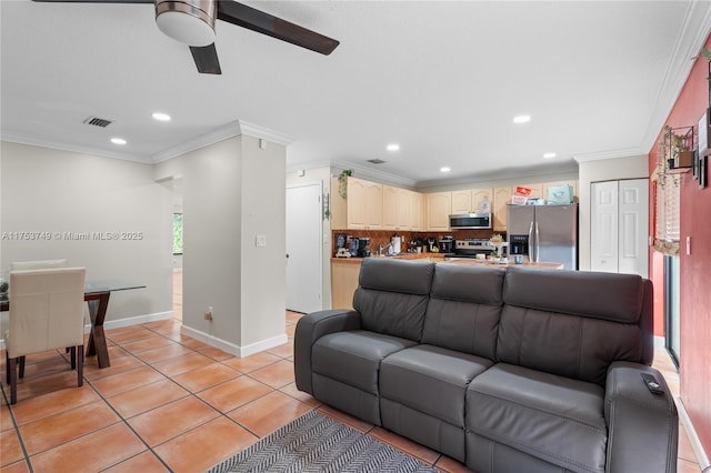 living area with light tile patterned floors, recessed lighting, visible vents, baseboards, and ornamental molding