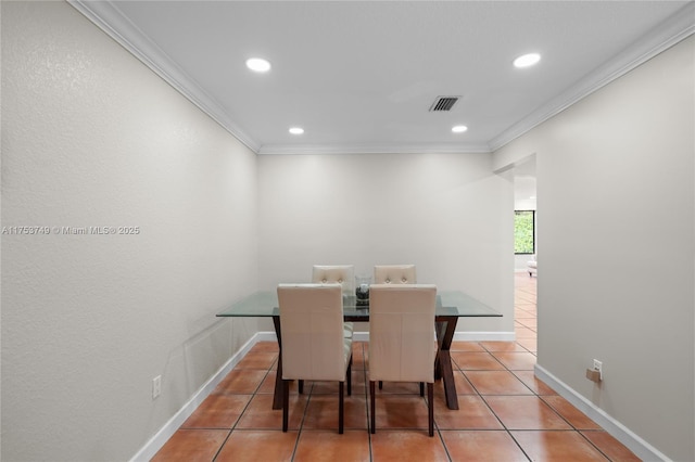 dining space with light tile patterned flooring, recessed lighting, visible vents, baseboards, and crown molding