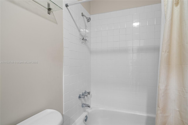 bathroom featuring toilet and shower / tub combo