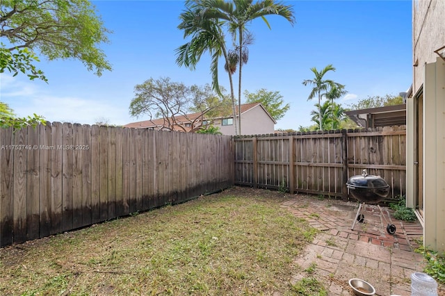 view of yard featuring a fenced backyard