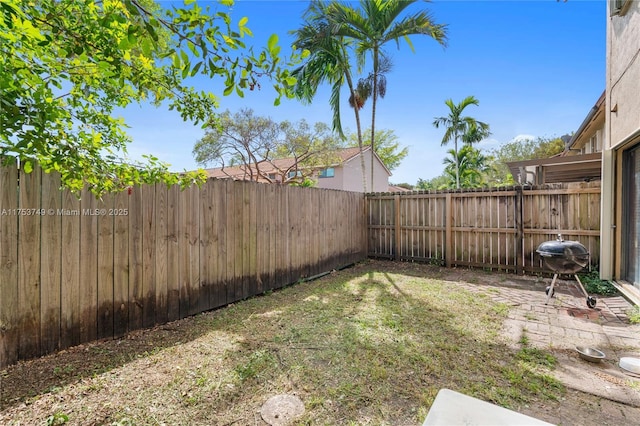 view of yard featuring a fenced backyard