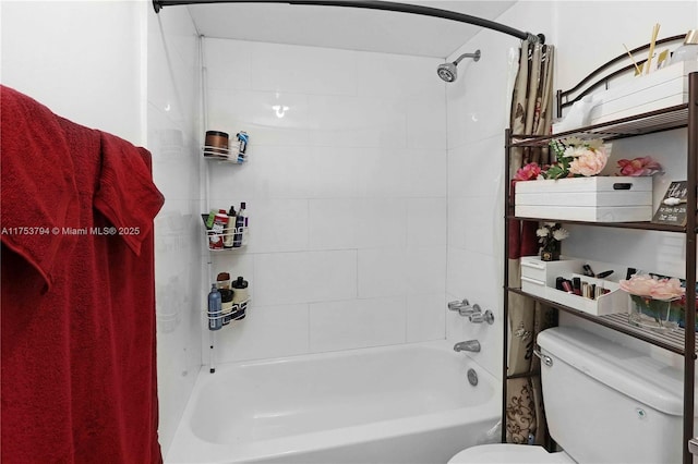 full bathroom with bathing tub / shower combination and toilet