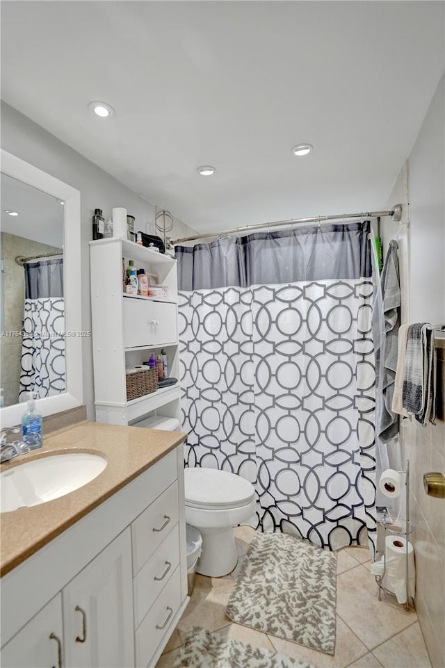 bathroom with toilet, a shower with curtain, tile patterned flooring, vanity, and recessed lighting