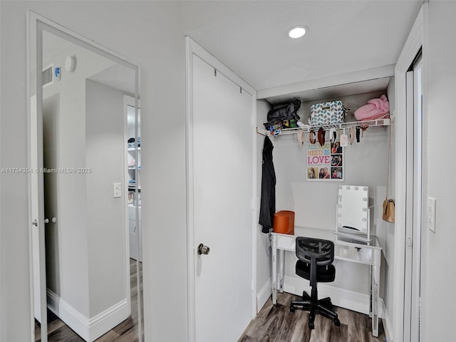 office space featuring recessed lighting, wood finished floors, and baseboards