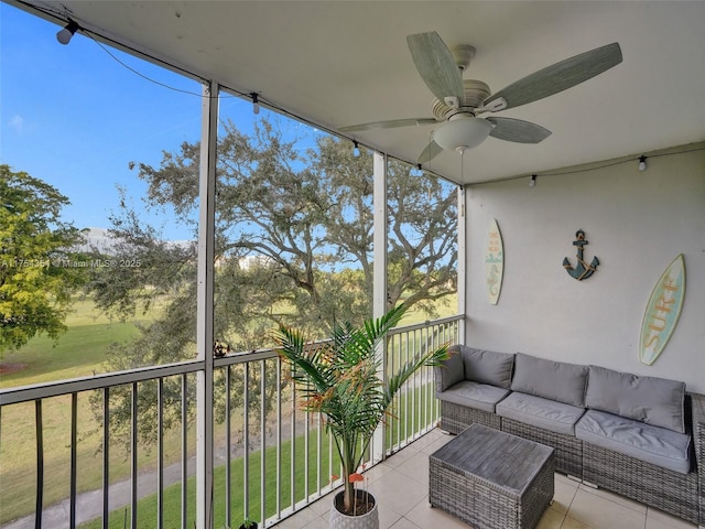 balcony featuring outdoor lounge area and a ceiling fan