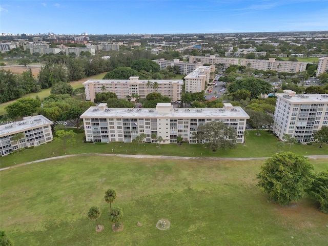 birds eye view of property with a city view