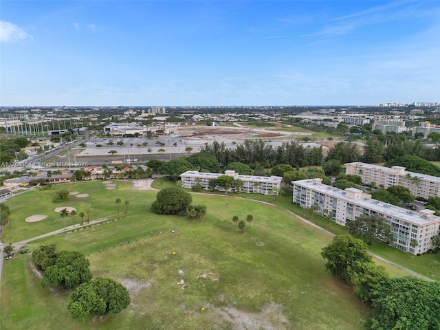 bird's eye view featuring a view of city and golf course view