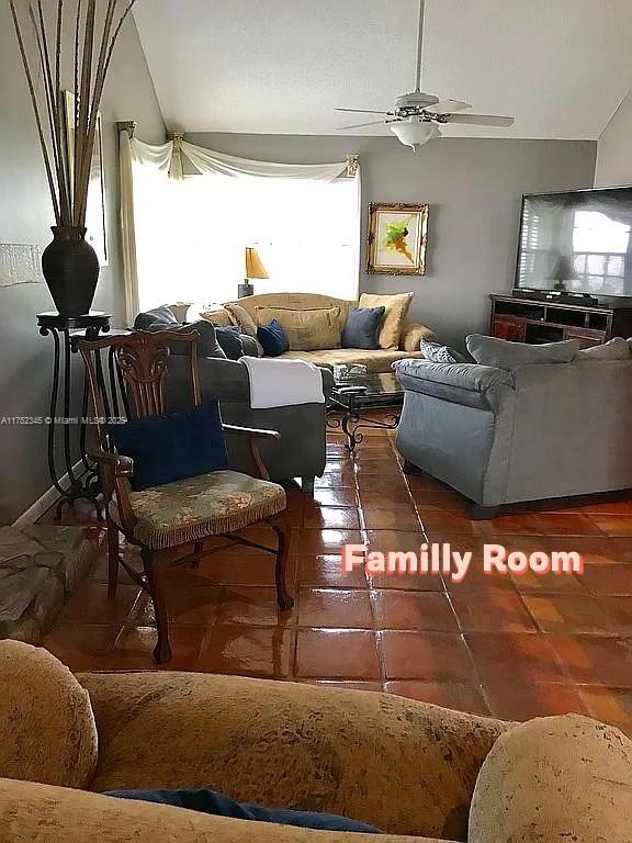 1350 S Fieldlark Ln, Homestead, FL 33035 - tiled living room with ceiling fan