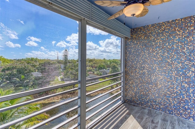 balcony featuring ceiling fan