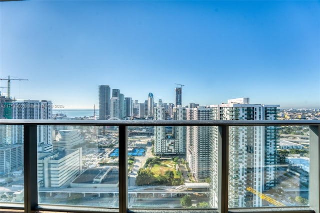 balcony featuring a view of city