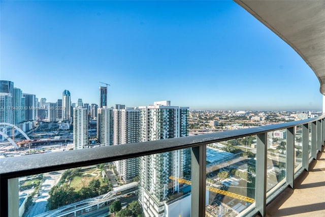 balcony featuring a city view