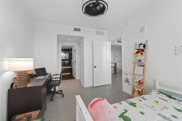 bedroom with tile patterned flooring and visible vents