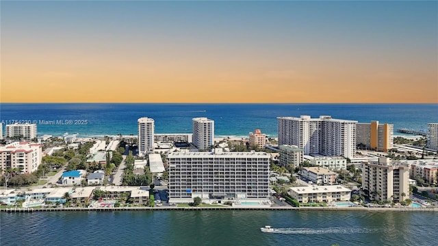 521 N Riverside Dr Unit 808, Pompano Beach, FL 33062 - aerial view at dusk featuring a water view and a view of city