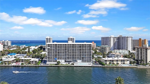 bird's eye view with a view of city and a water view