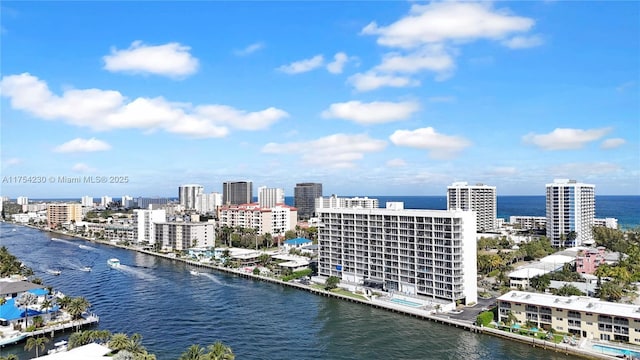 drone / aerial view with a water view and a view of city