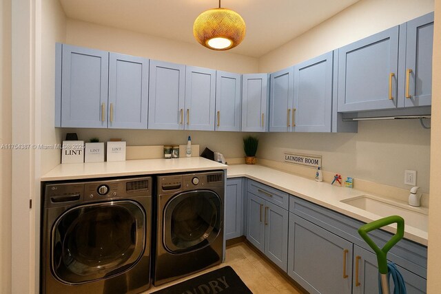 2980 Windmill Ranch Rd, Weston, FL 33331 - laundry area with washing machine and clothes dryer and cabinet space