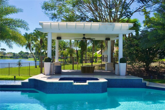 2980 Windmill Ranch Rd, Weston, FL 33331 - view of swimming pool with a ceiling fan, a gazebo, a water view, and a pool with connected hot tub