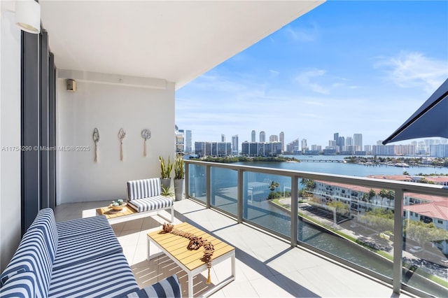 balcony with a city view and a water view