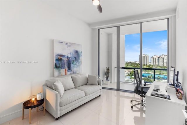 office space with expansive windows, baseboards, and light tile patterned floors