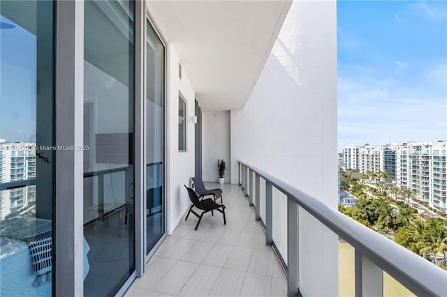 balcony featuring a city view