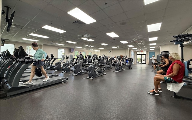 gym featuring visible vents and a drop ceiling